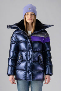 Woodpecker Women's Bumnester Winter coat. High-end Canadian designer winter coat for women in shiny "Sapphire/Silver/Purple" colour. Woodpecker cruelty-free winter coat designed in Canada. Women's heavy weight medium length premium designer jacket for winter. Superior quality warm winter coat for women. Moose Knuckles, Canada Goose, Mackage, Montcler, Will Poho, Willbird, Nic Bayley. Extra warm. Shiny parka. Stylish winter jacket. Designer winter coat.