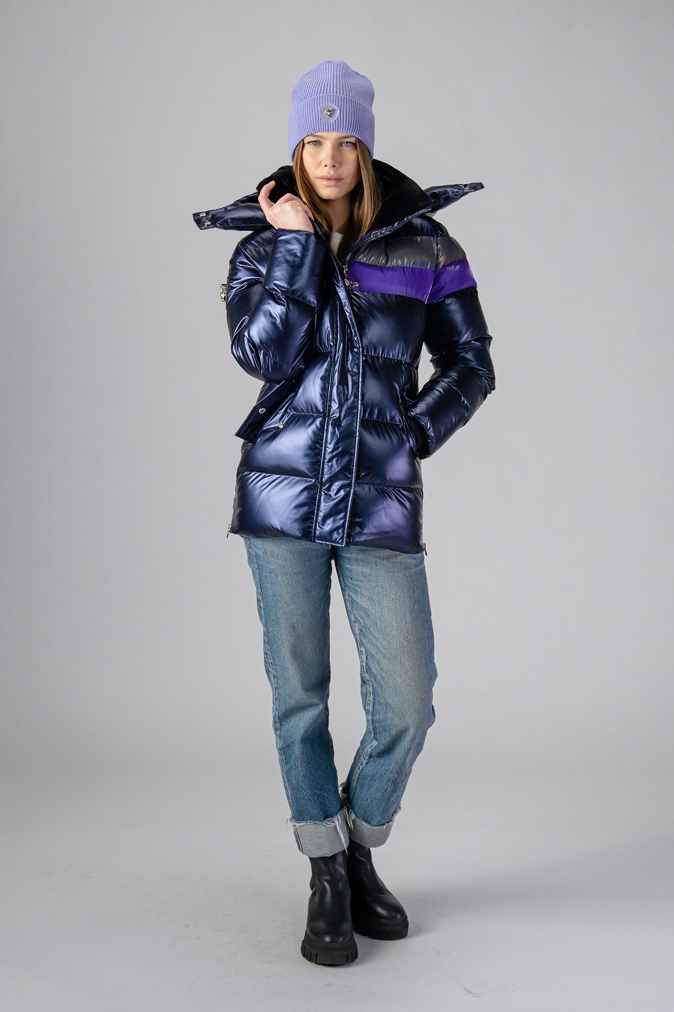 Woodpecker Women&#39;s Bumnester Winter coat. High-end Canadian designer winter coat for women in shiny &quot;Sapphire/Silver/Purple&quot; colour. Woodpecker cruelty-free winter coat designed in Canada. Women&#39;s heavy weight medium length premium designer jacket for winter. Superior quality warm winter coat for women. Moose Knuckles, Canada Goose, Mackage, Montcler, Will Poho, Willbird, Nic Bayley. Extra warm. Shiny parka. Stylish winter jacket. Designer winter coat.