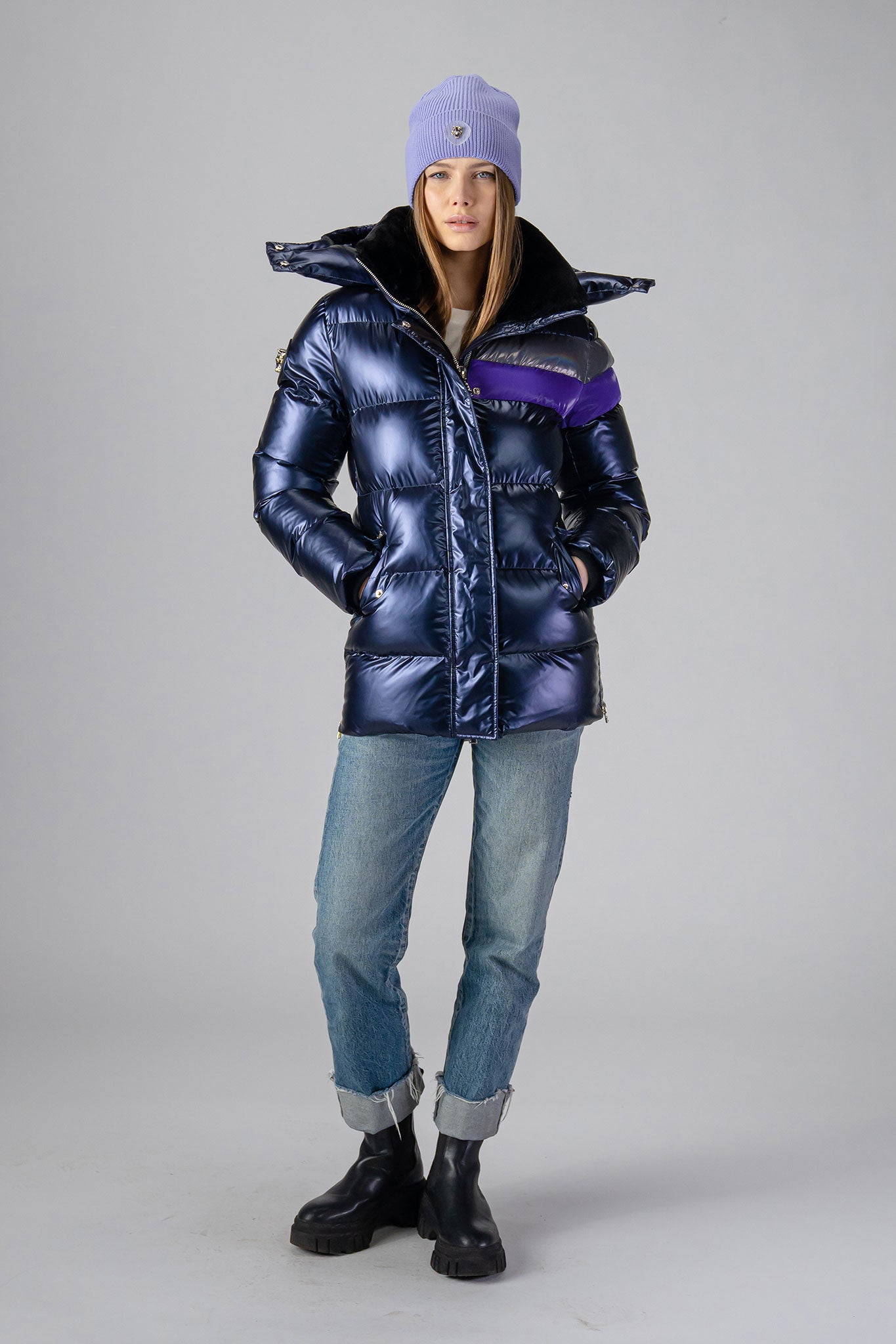 Woodpecker Women&#39;s Bumnester Winter coat. High-end Canadian designer winter coat for women in shiny &quot;Sapphire/Silver/Purple&quot; colour. Woodpecker cruelty-free winter coat designed in Canada. Women&#39;s heavy weight medium length premium designer jacket for winter. Superior quality warm winter coat for women. Moose Knuckles, Canada Goose, Mackage, Montcler, Will Poho, Willbird, Nic Bayley. Extra warm. Shiny parka. Stylish winter jacket. Designer winter coat.