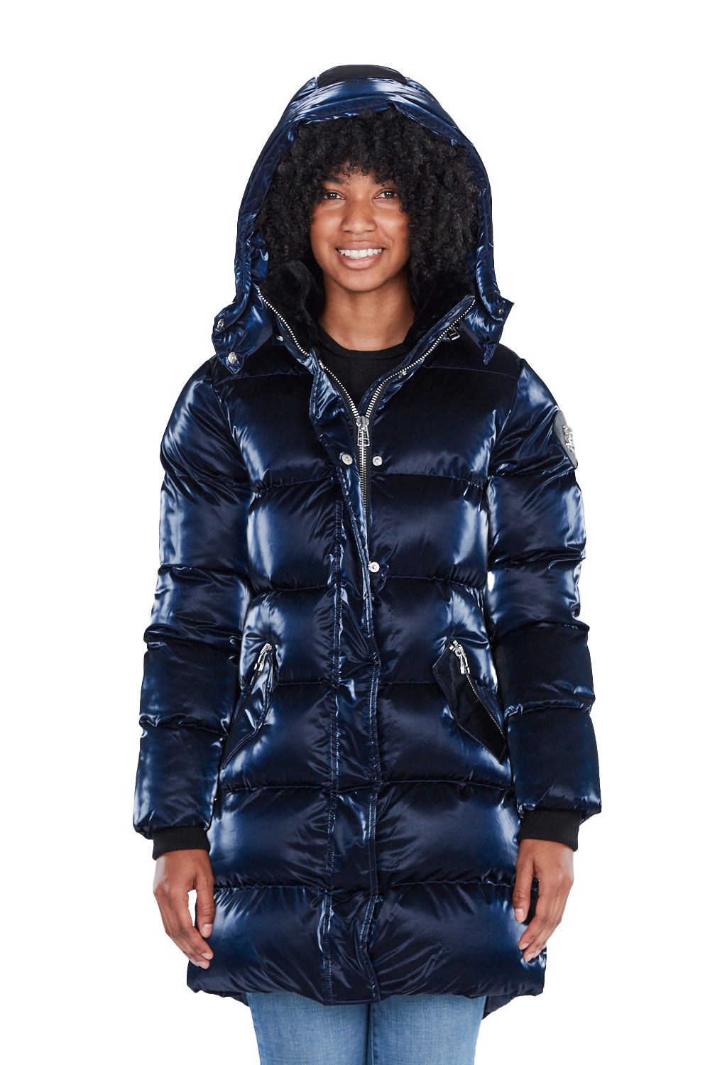 Woodpecker Women&#39;s Penguin Long Winter coat. High-end Canadian designer winter coat for women in shiny &quot;All Wet Navy&quot; blue colour. Woodpecker cruelty-free winter coat designed in Canada. Women&#39;s heavy weight long length premium designer jacket for winter. Superior quality warm winter coat for women. Moose Knuckles, Canada Goose, Mackage, Montcler, Will Poho, Willbird, Nic Bayley. Extra warm. Shiny parka. Stylish winter jacket. Designer winter coat.